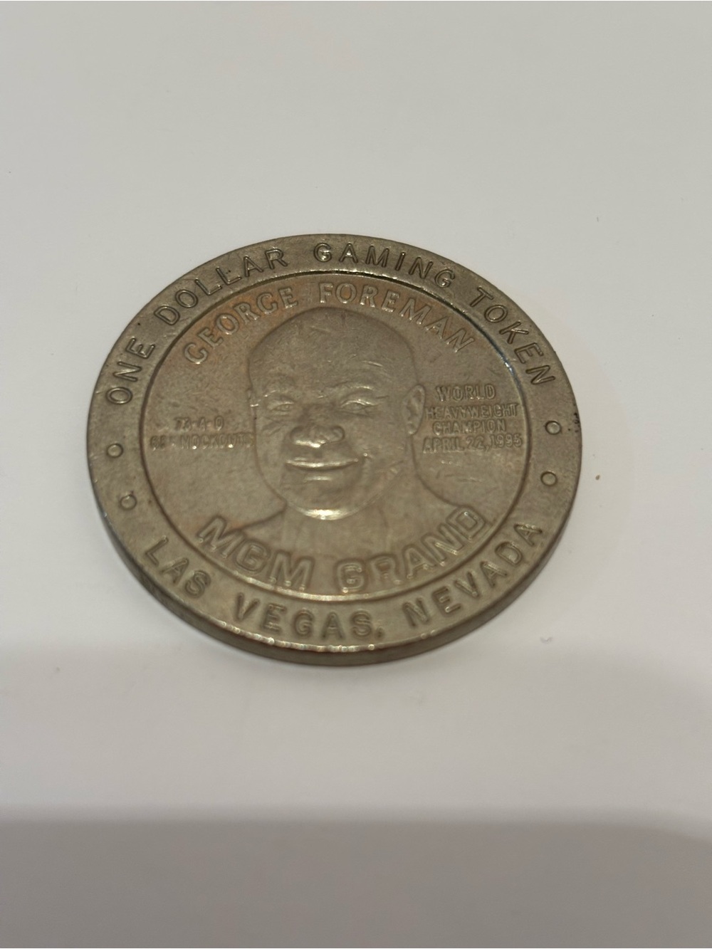 MGM Grand Vegas One Dollar $1 Gaming Token 1995 George Foreman Souvenir